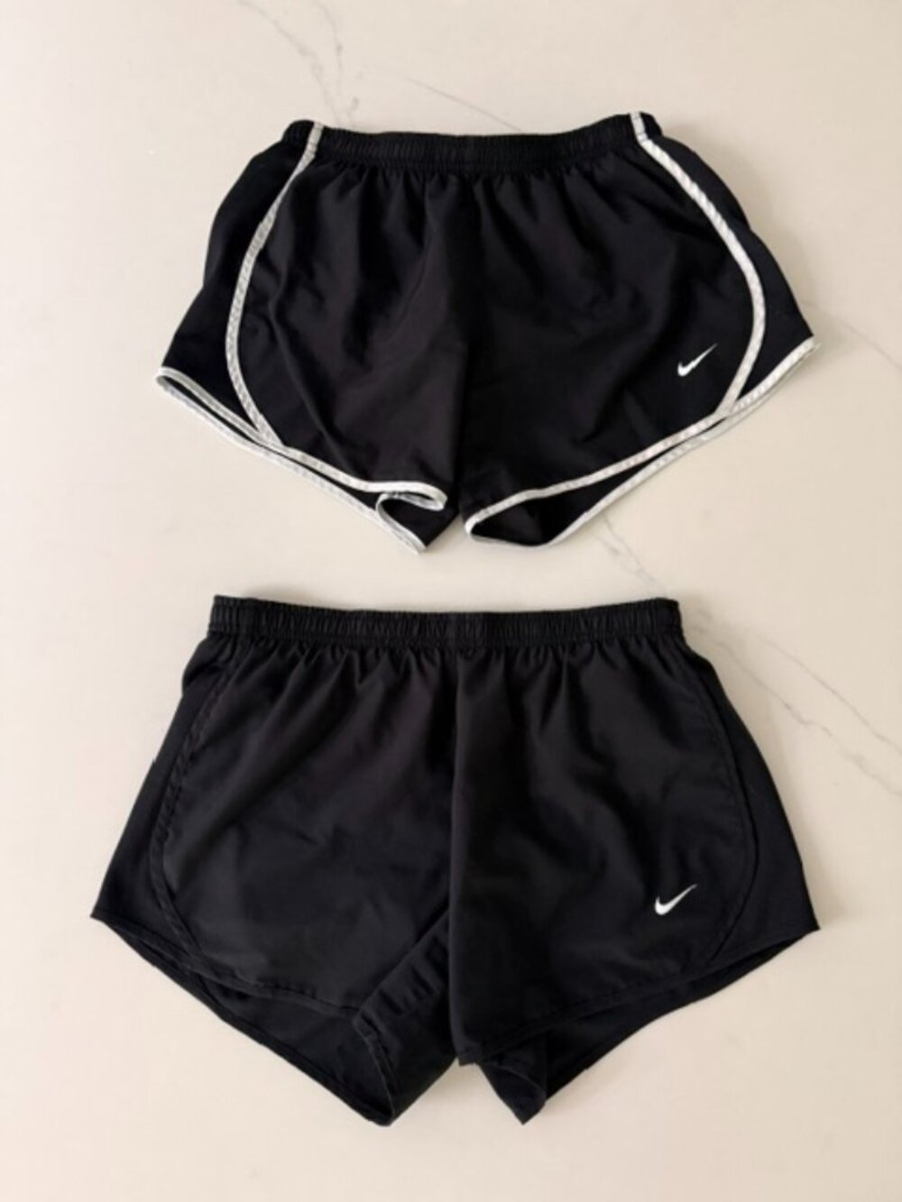 2 pairs Nike Girls Tempo shorts size large in black and black with white piping